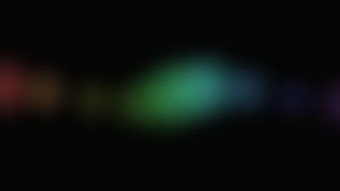 Abstract soft glowing light flares with orange and blue hues on black canvas 库存影片 335117565