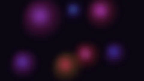 Abstract soft glowing light spheres floating on a deep black background 库存影片 335149763