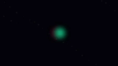 Abstract soft glowing red and green circular lights on a solid black backdrop Stock Footage 338311381