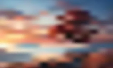 Abstract soft sky background with blue and orange clouds through frosted gl.. 스톡 일러스트