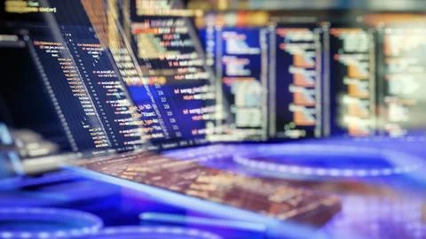 Abstract Software Development Background with Programming Code on Multiple Sc Stockfoto's