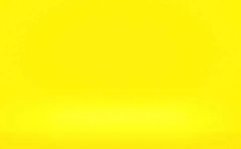 Abstract solid of shining yellow gradient studio wall room background. Abs... 写真素材