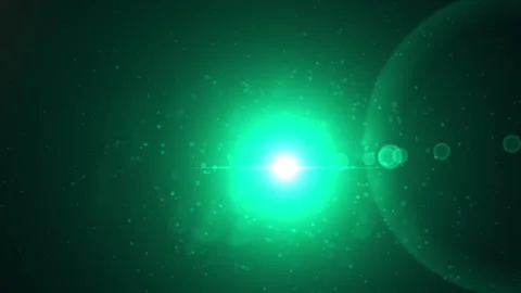 Abstract space scene with a bright green flare, lens effects, floating particles Stock Footage 309452642
