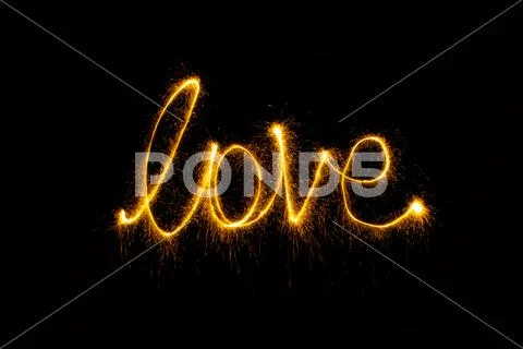 Abstract sparkler firework light on black background Stock Photos