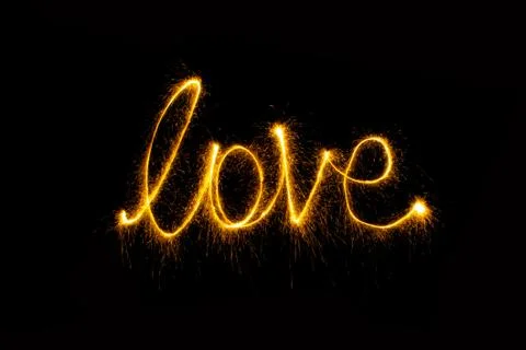 Abstract sparkler firework light on black background Stock Photos