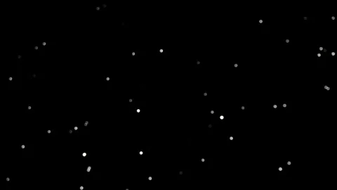 Abstract sparkling bokeh light dots on black background shrinking in size Stock Footage 328143232