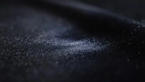 Abstract Sparkling Particles on Black Background Stock Footage 324807597