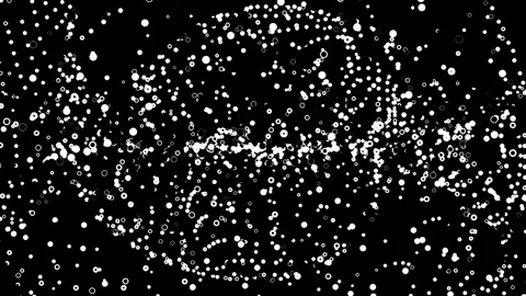 Abstract sparkling particles swirl across a dark background. Stock Footage 334093539