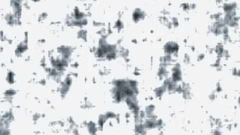 Abstract speckled texture moving across black background with subtle grain .. Stock Footage 340951029