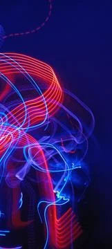 Abstract speed lighting night motion multiple colors with black background. 库存照片