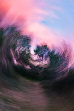 Abstract Spin Motion Blur of Trees at Sunset 스톡 사진