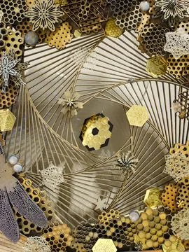 Abstract Spiral Composition with Metallic and Natural Motifs Stock Photos