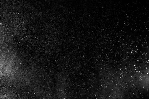 Abstract splashes of water on black background. Stock Photos