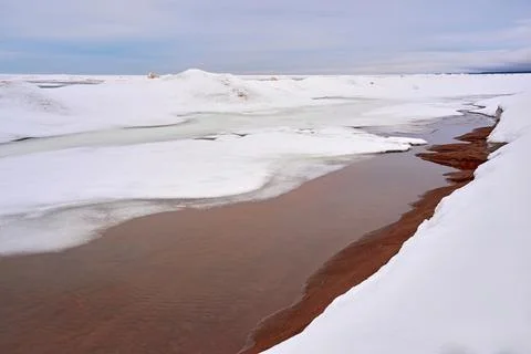Abstract spring landscape of a winter arctic surface of water space Stock Photos