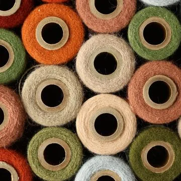 Abstract square background collection of antique yarn spools Stock Photos