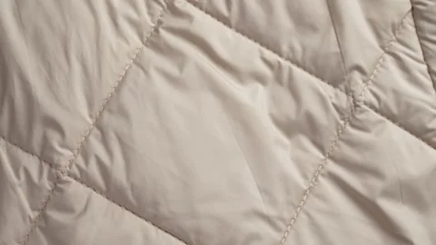 Abstract square pattern of a winter warm sport down jacket Stock Footage 264273100