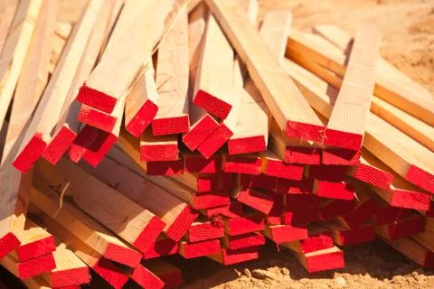 Abstract Stack of 2x4 Construction Wood with Red Painted Ends. Stock Photos