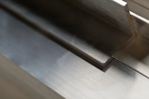 Abstract stack of aluminium profiles close up, industrial background macro 스톡 사진