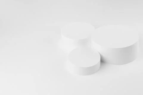 Abstract stage mockup with set of three round podiums for presentation cosmet Fotos de archivo