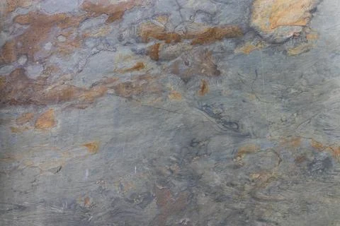 Abstract Stone Background, Weathered Rock Surface with Earthy Hues and Veining Stock Photos