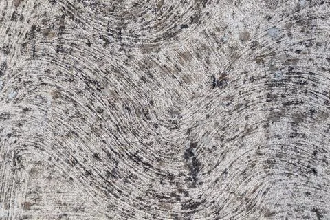 Abstract stone texture with circular patterns in gray and black Stock Photos