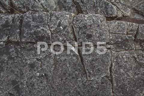 Abstract stone texture from waves erode, nature background. Top view. Copy sp Stock Photos