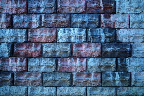 Abstract stone tile texture brick wall background. Vintage multicolor brick wall Stock Photos