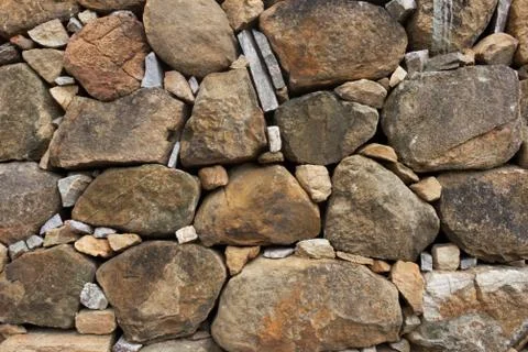 Abstract stone wall pattern and background Stock Photos