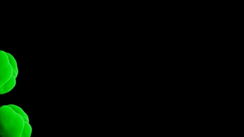 Abstract stylized Green ink drop in water on a black background V20 Video stock 87565289