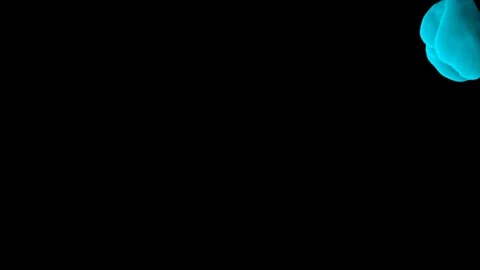 Abstract stylized Light Blue ink drop in water on a black background V4 Video stock 87565317