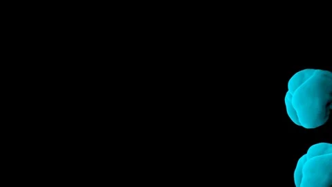 Abstract stylized Light Blue ink drop in water on a black background V16 Video stock 87565347