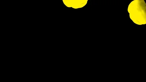 Abstract stylized Yellow ink drop in water on a black background V13 Stock Footage 87568865