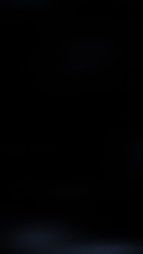 Abstract subtle blue light streaks flowing horizontally across deep black bac Stock Footage 321842002