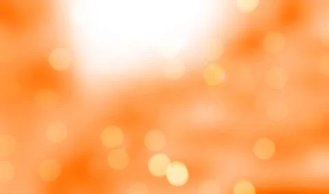Abstract summer background. Orange background with defocused light. Stock-Fotos