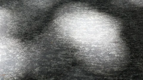 Abstract sunlight and shadow of tree leaves on concrete ground Stock Footage 122235569