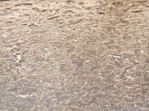 Abstract Sunlit Water Surface Texture with Natural Ripple Patterns Stock Photos