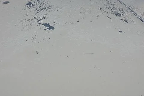 Abstract surface with gray paint spots, creating a textured effect Stock Photos