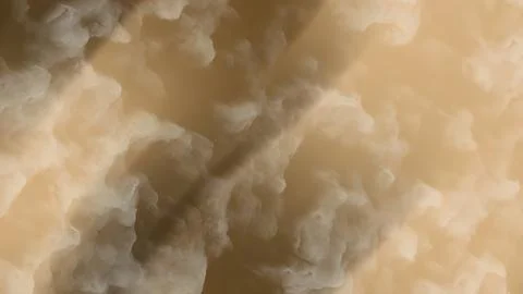 Abstract swirling patterns of light beige and cream tones. Stock Photos