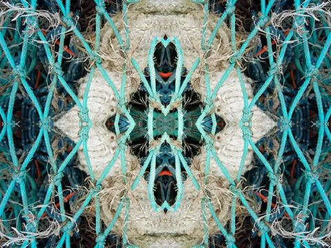 Abstract symmetric pattern of fishnet and fishing lines Foto stock