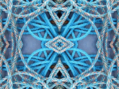 Abstract symmetric pattern of fishnet and fishing lines Foto stock