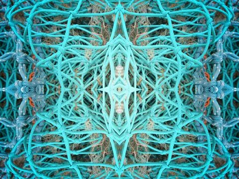Abstract symmetric pattern of fishnet and fishing lines Foto stock