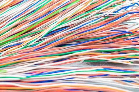 Abstract technology background. Many thin electrical wires of different color 库存照片