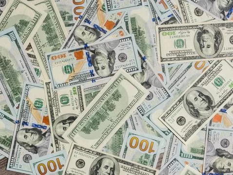 Abstract texture of 100 dollar new bills. Stock Photos