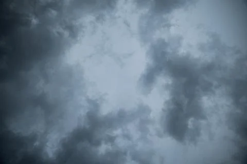 Abstract texture background of Dark sky with storm clouds. Stock Photos