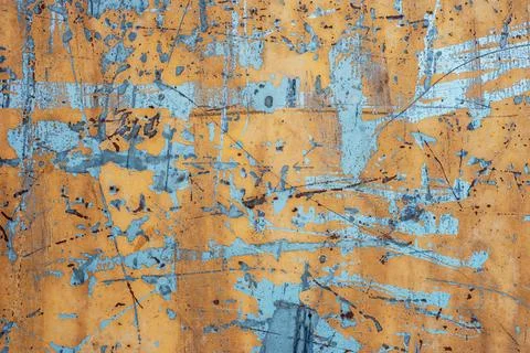 Abstract texture background of a painted yellow weathered, cracked and peel.. Stock Photos