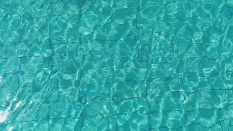 Abstract texture of blue ripples water of swimming pool. Video stock 299280154