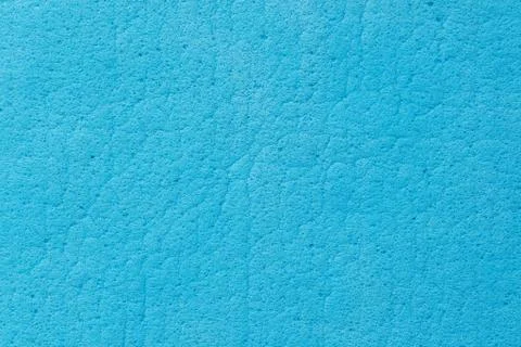 Abstract texture of blue sponge for cleaning. Stock Photos