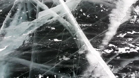 Abstract texture of broken white ice and dark water at winter. Cracked ice. Stock Footage 144159571