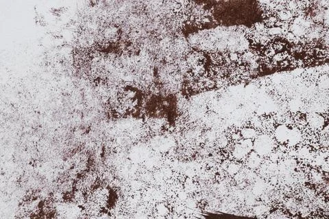 An abstract texture of brown acrylic paint stains and marks on a white backgr Illustrazione stock