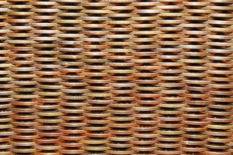 Abstract texture of coins defocus Stock Photos